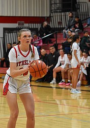 Shaylee Freeman, a senior for the Huskies, looks to make a free throw during Thursday’s game against Connell.