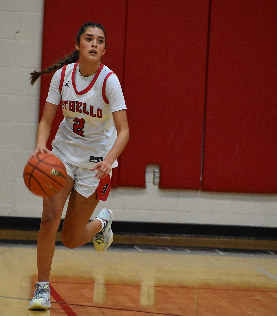 Othello sophomore Khloe Valdez sprints down the court during Thursday’s game after gaining possession of the ball.