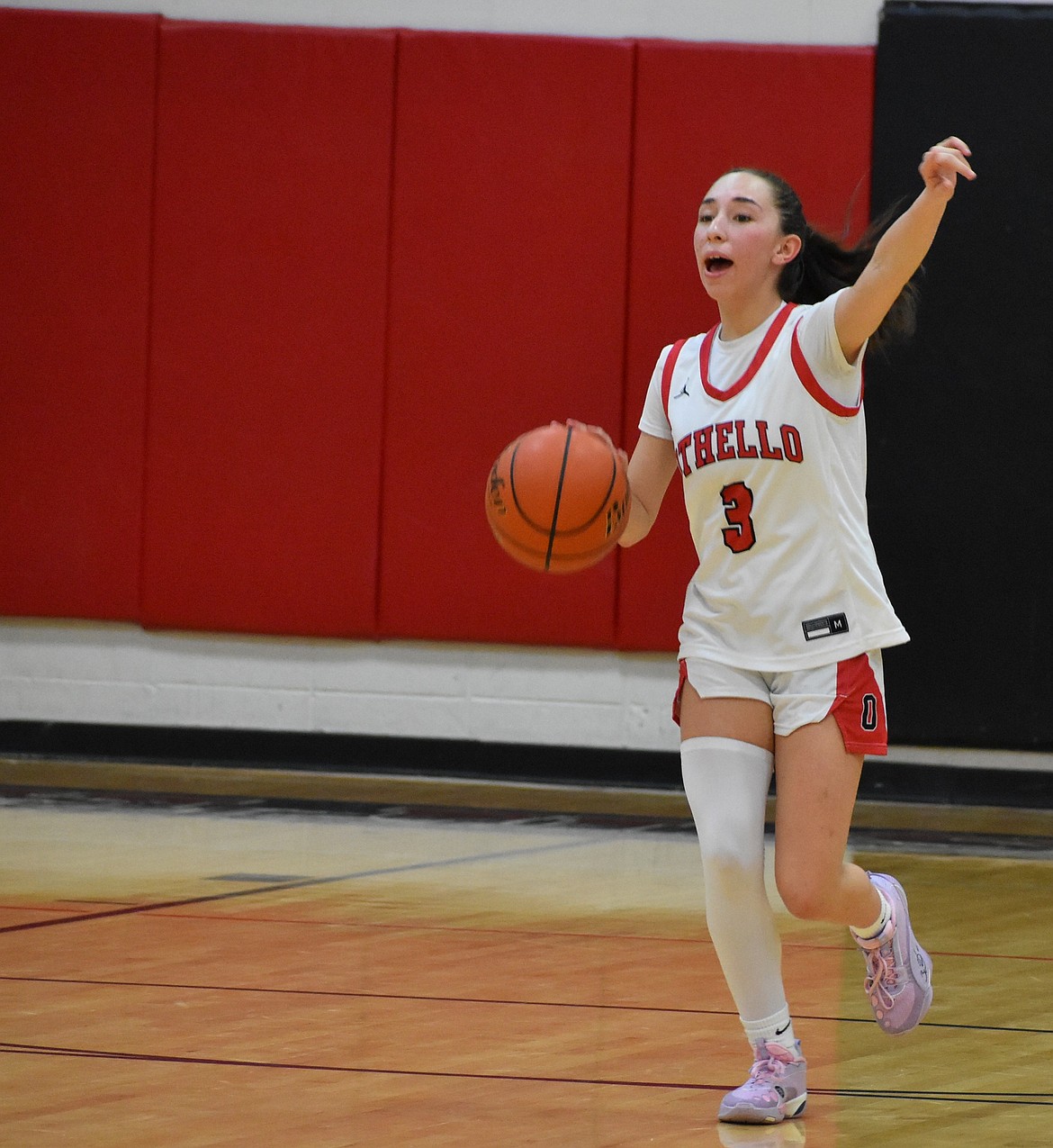 Meila Zuidema from OHS calls out to a teammate as she makes her way down the court during the game against Connell.