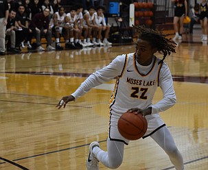Mavs junior TJ Jones uses quick footwork to move around a defending Ferris player during Friday’s matchup.