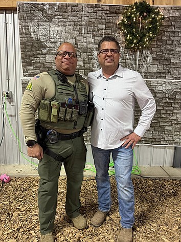 The Adams County Sheriff’s Office announced its supervisor of the year is Corporal Darryl Barnes, left. He smiles for a photo with Sheriff Dale Wagner, right.