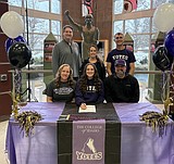 Signing photos Dec. 10, 2025