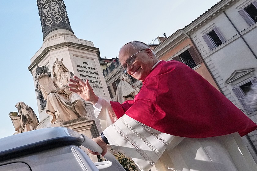 Pope Leo XIV leaves after praying in front of the statue of the Virgin Mary next to the Spanish Steps in Rome on Monday, the Catholic Feast of the Immaculate Conception.