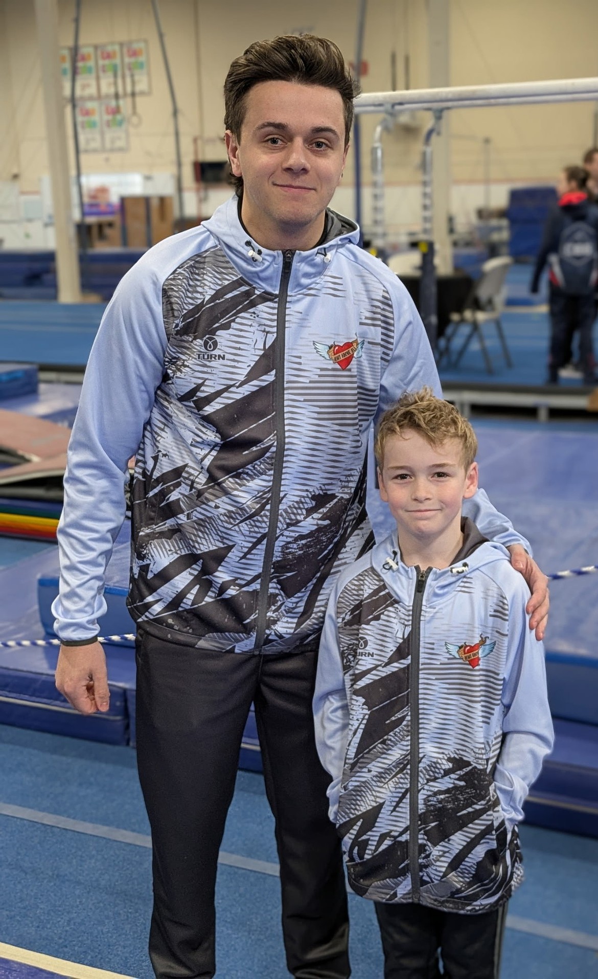 Courtesy photo
Avant Coeur Gymnastics Level 5 Jakob Clinton, right, with coach Jon Malstrom at the Cold Turkey Meet in Kent, Wash.