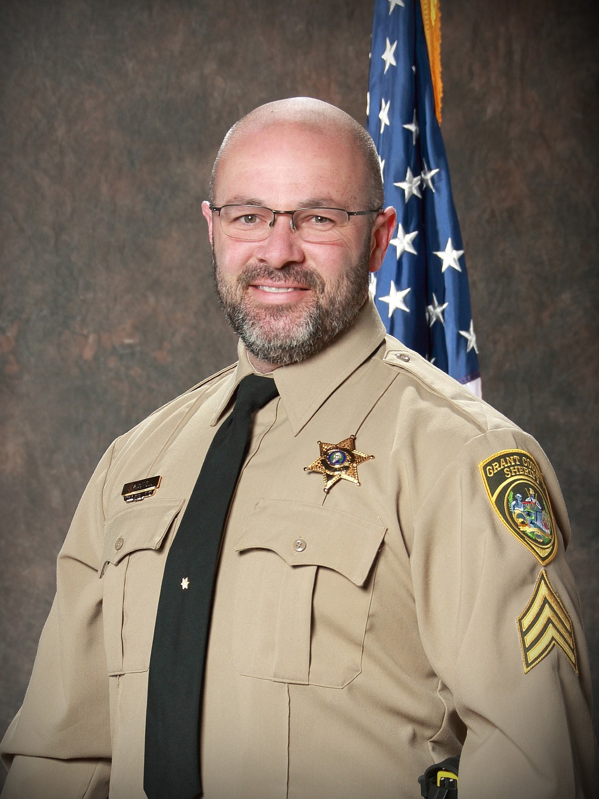 Sgt. Jason McDonnell helped a rural Soap Lake resident regain electricity after it had been shut off while the resident was in the hospital. He was called out by a postal worker who discovered a note asking for help inside a mailbox. The citizen was driven to the Grant County PUD office by McDonnell and was able to pay the power bill. McDonnell then drove the citizen home.