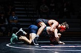 PREP WRESTLING: Trojans take care of Lake City