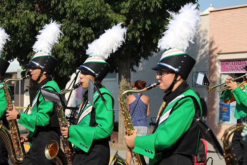 The Quincy High School band marches in the annual Farmer Consumer Awareness Day parade in September. Quincy School District voters will decide the fate of a four-year educational programs and operations levy in February, and among many other things, levy money helps pay for band travel and other expenses.