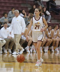 The Mavs’ Ella Wiltbank (24) dribbles the ball up the court against Wenatchee. Moses Lake defeated the Panthers 46-43 on Friday.