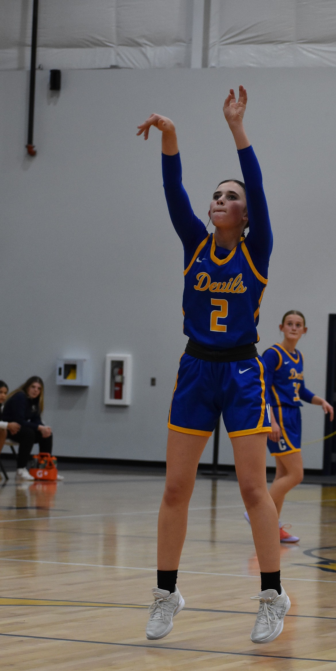 Kaydence Leslie, a sophomore with the Devils, shoots a free throw during Thursday’s game against the Lions.