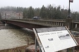 County in flood, high wind watch