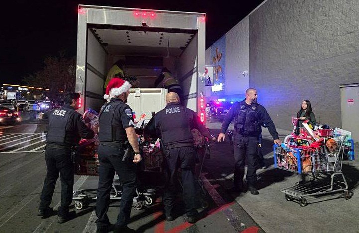 The Moses Lake Police Department collected toys outside Walmart Saturday as part of its Cops for Tots program.