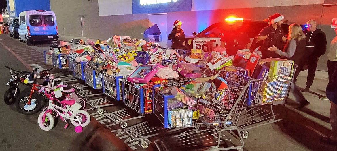In just a few hours, the Moses Lake Police collected 17 shopping carts full of toys, as well as five bikes and $2,400 in cash.
