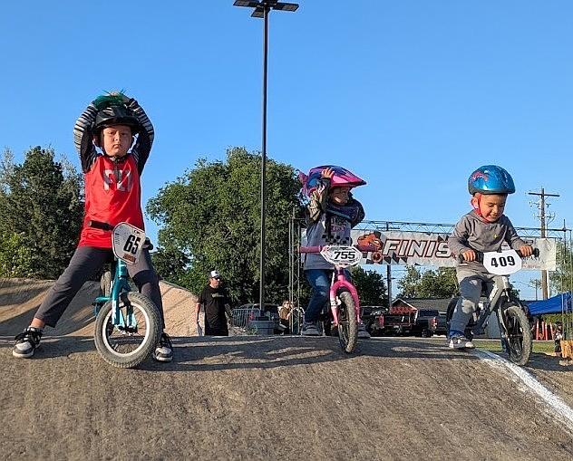 Young riders at the Race for Life event in June prepare to ride at the top of the hill at the Moses Lake BMX track. Moses Lake BMX President Jeff Niehenke said the goal for next season will be to try and bring in more new riders and overall increase the amount of riders.