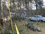 One dead after tree falls into Fernan Village home