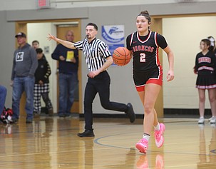 The Broncos’ Saige Galbreath dribbles the ball up the court against the Warden Cougars. Lind-Ritzville has started the season strong with a 4-1 record.