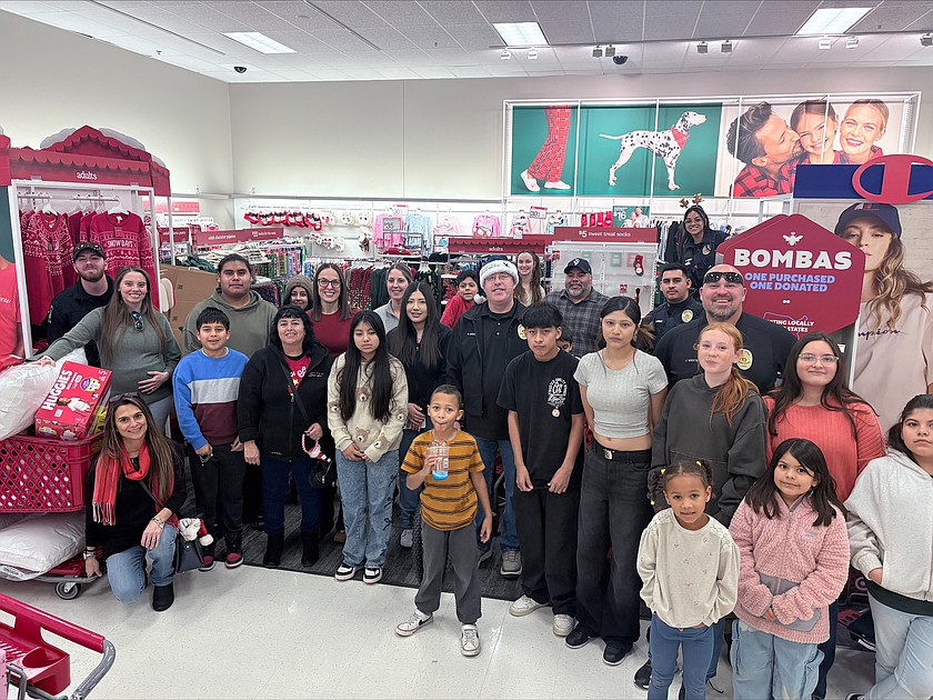 Ten Quincy families took a shopping trip to Target in Wenatchee as part of Quincy Police Department’s Shop with a Cop event Dec. 6.