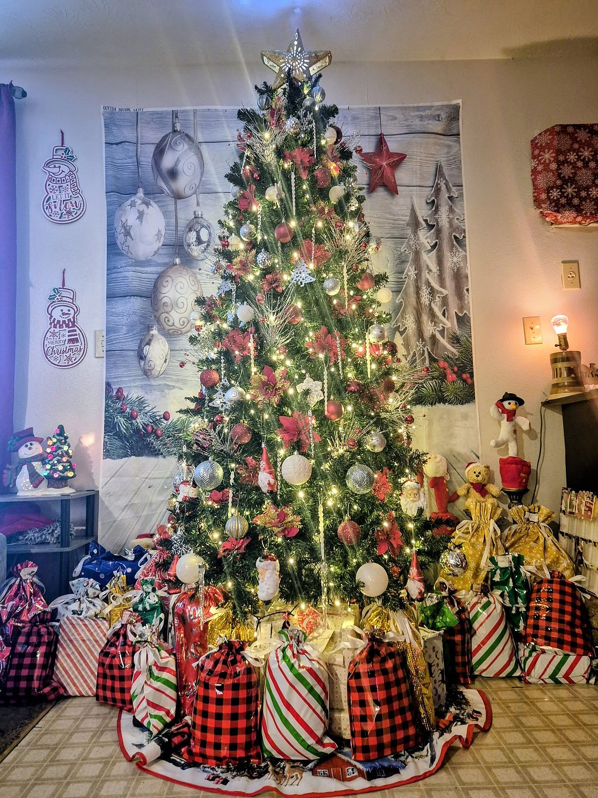 “Christmas is my absolute favorite time of the year,” said Sarah Tinney with her submission of this photo of the family Christmas tree. “The lights and decorations are all so beautiful. I love seeing the joy in my little guys eyes looking at all the Christmas lights and decor. I love the constant reminders of why this Holiday is so special. Jesus's birth! His love for me and constant pursuit for me heart has completely set free from drug addiction and darkness. I am beyond blessed to have a home to decorate for me and my little man and honored to be able to host our family Christmas get together in. To me, Christmas is the most beautiful and special holidays because of family, friends, lights, beauty and Jesus!”