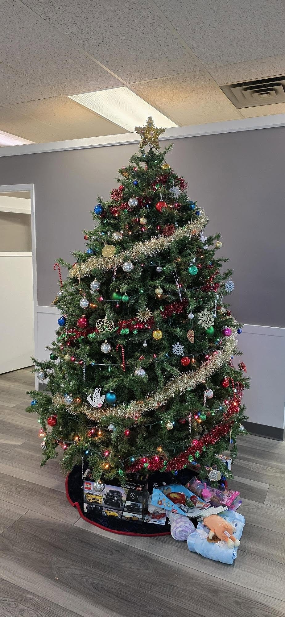 The Columbia Basin Herald’s tree this year sits with unwrapped presents for local children. Jeannie Austin, our advertising director, is one of the founders of Moms Helping Moms of Grant County which does a variety of holiday activities to support local parents trying to give their children a great holiday.