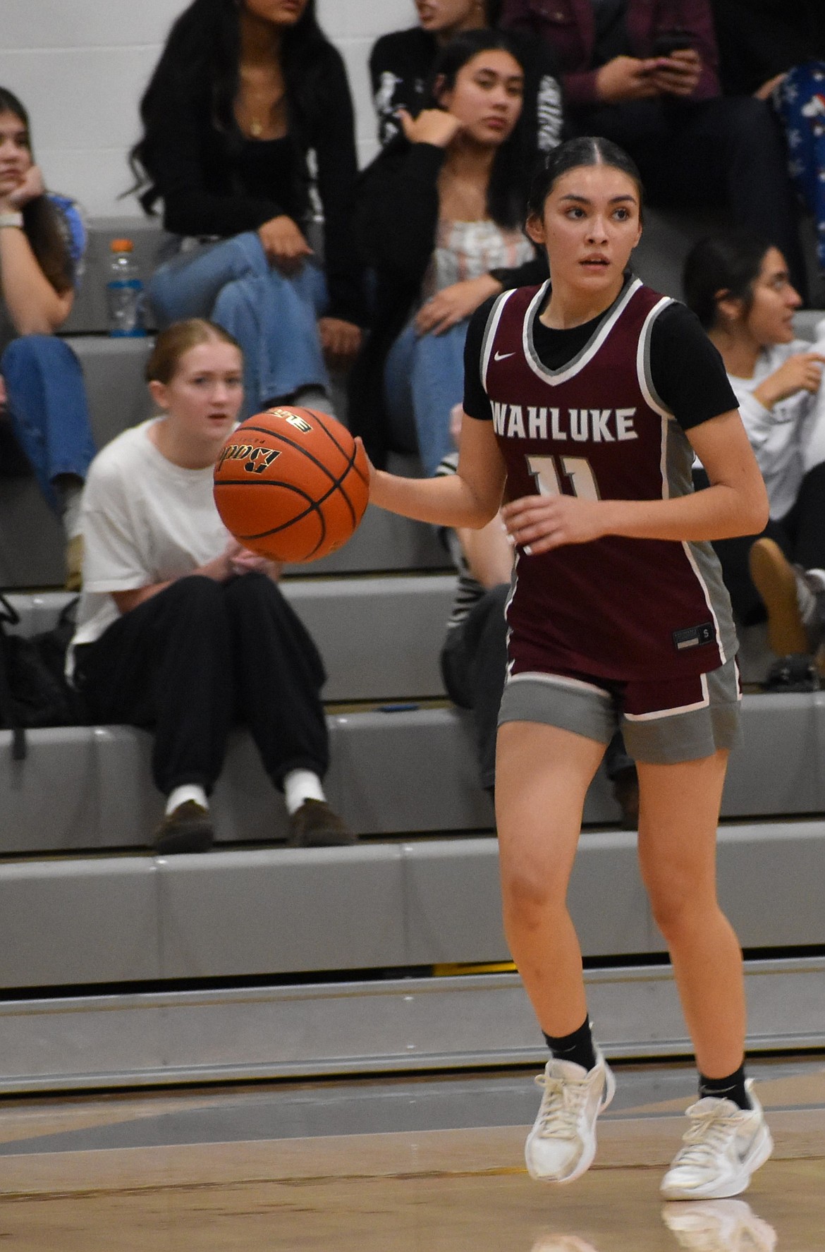 Wahluke’s Yohary Magana looks for an opening to make a move on offense after gaining possession of the ball against Royal.