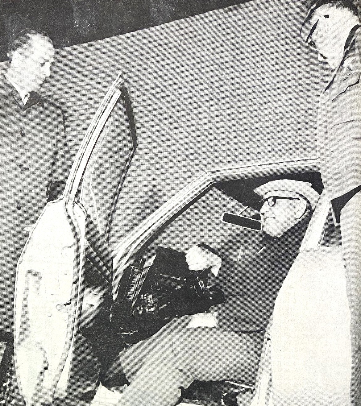 From left, top local cops George Lenz, John Bender and Jack McGinnis warn residents not to drink and drive at Christmas 1970.