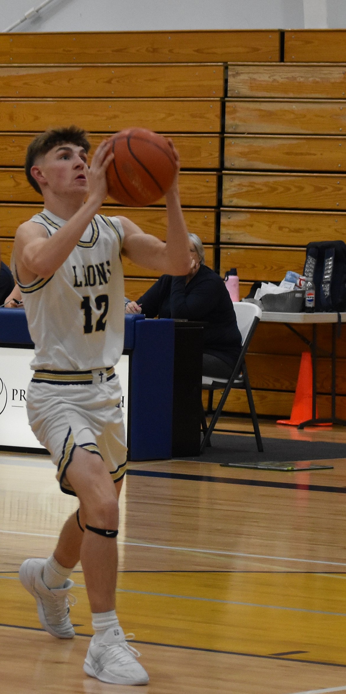 Treyson Kast from MLCA/CCS goes in for the layup during a game earlier this season. The Lions are undefeated at 7-0 going into winter break and will return in January to play DeSales.