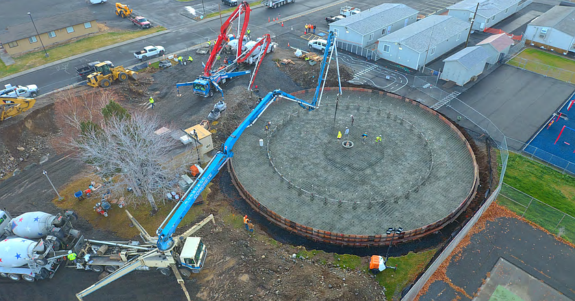 At the beginning of 2025, the water tower was just a concrete slab. By December 2025, the water tower has been partially filled and connected to the main water line.