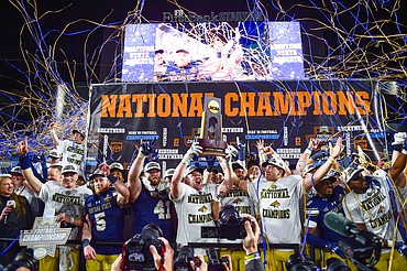 Montana State celebrates with the FCS National Championship trophy after their 35-34 overtime victory over Illinois State at FirstBank Stadium in Nashville on Monday, Jan. 5. (Casey Kreider/Daily Inter Lake)