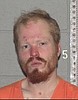Man charged with felony for allegedly threatening gas station employee with knife