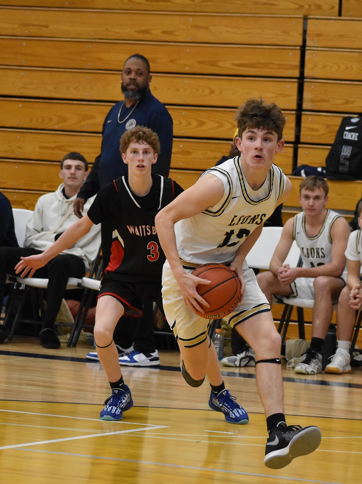 Lions junior Treyson Kast gets ready to go for the layup against Waitsburg on Monday.