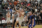 PREP BOYS BASKETBALL: Lysne lifts Post Falls in 6A IEL opener