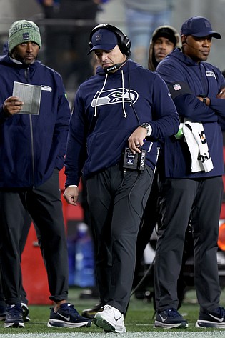 Seattle Seahawks head coach Mike Macdonald stands on the field during an NFL football game against the San Francisco 49ers, Saturday Jan. 03, 2026, in Santa Clara, Calif. (AP Photo/Scot Tucker)
