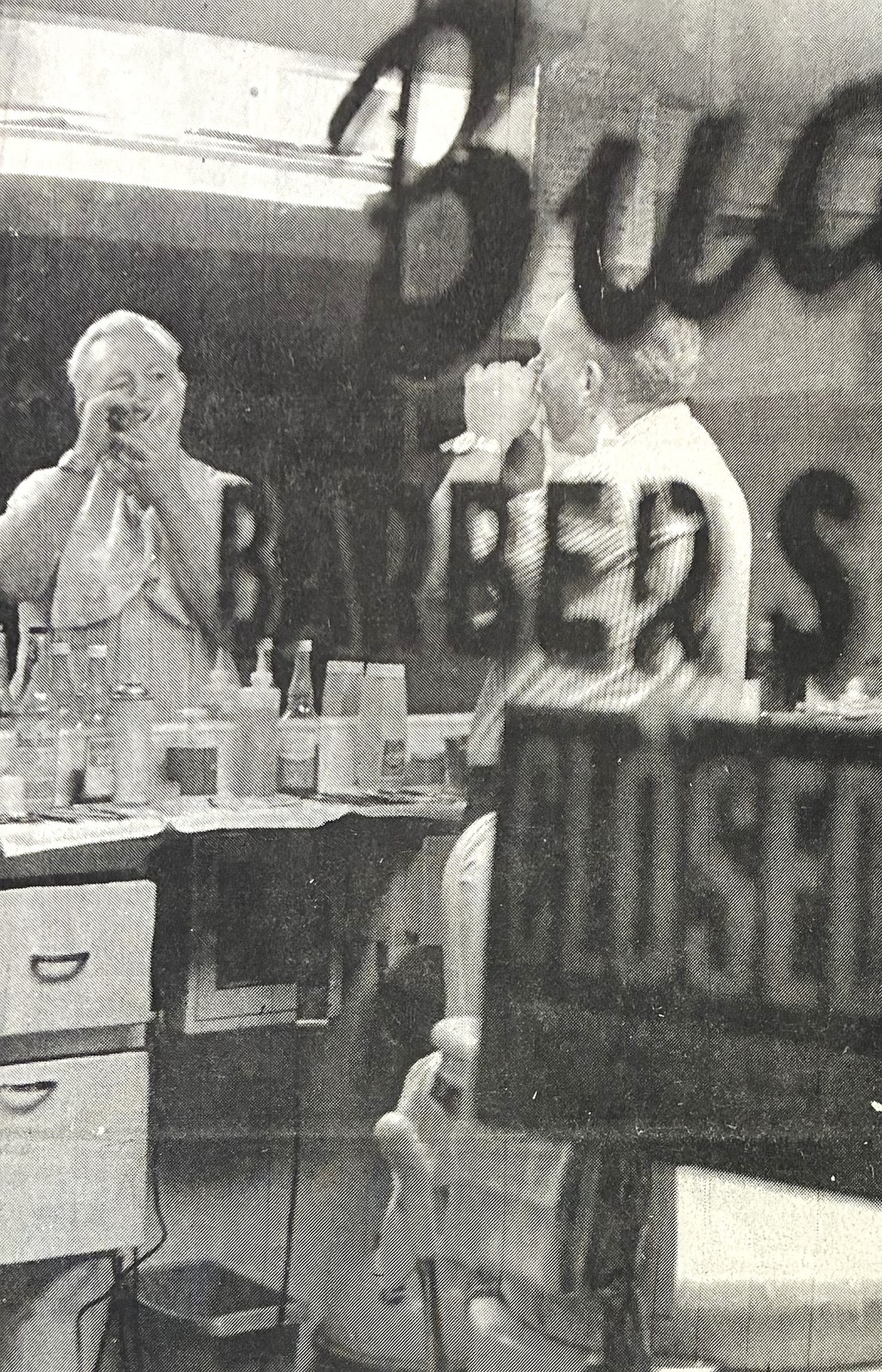 Barber Francis “Bud” Perry offers razor shaves in 1981.