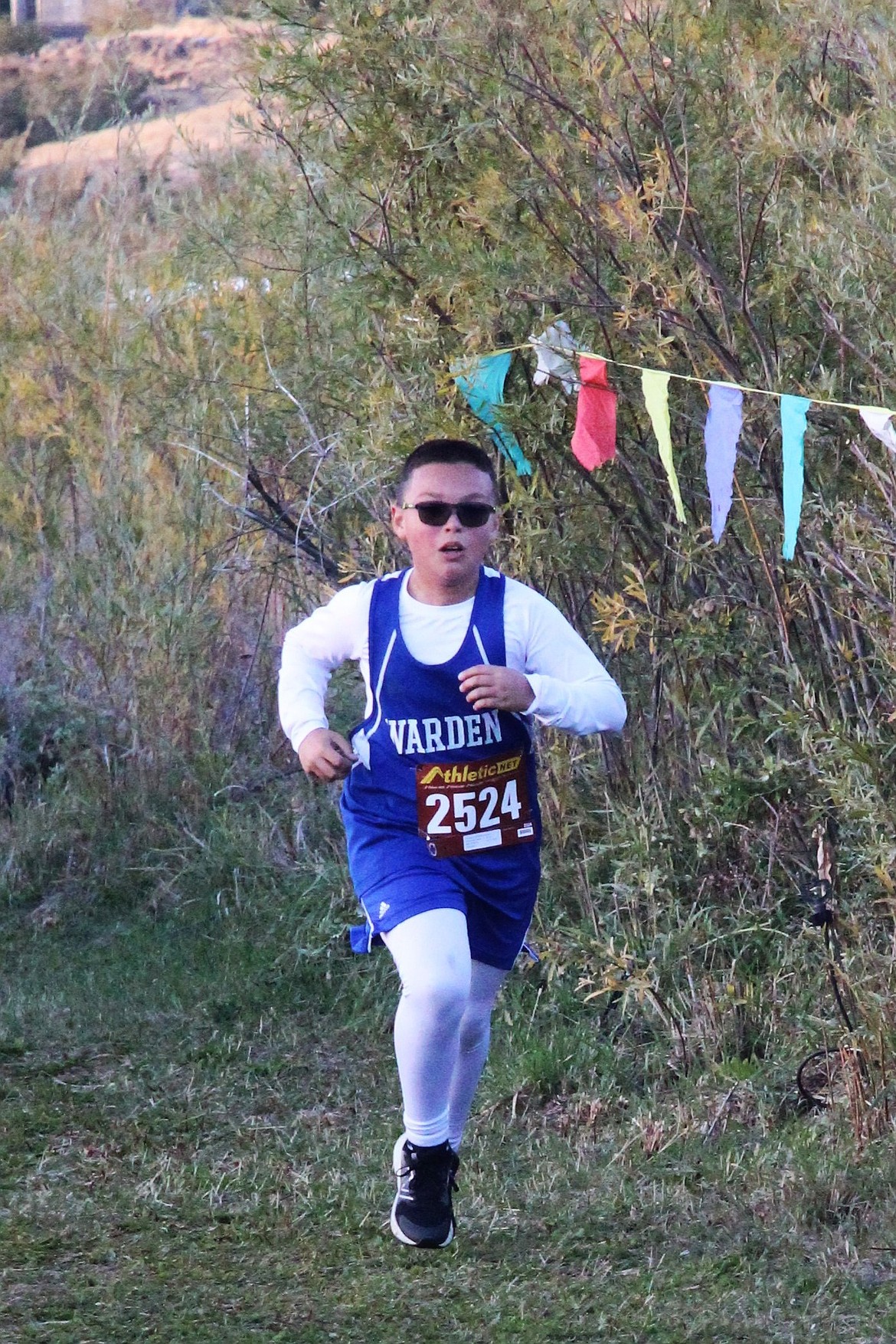 Warden Middle School cross country runner Carlos Hernandez navigates the course during an October 2025 meet. Extracurricular activities like cross country are funded through the district’s educational programs and operations levy.