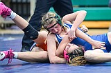 Time to wrestle: Glacier’s Katelyn Sphuler is a busy girl, on and off the mat