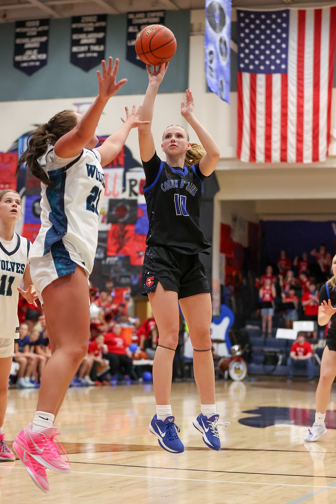 JASON DUCHOW PHOTOGRAPHY
Coeur d'Alene senior guard Karisa Wallis shoots over Lake City defender Taylor Brouse during the second half of Friday's Fight for the Fish spirit game at Lake City High.