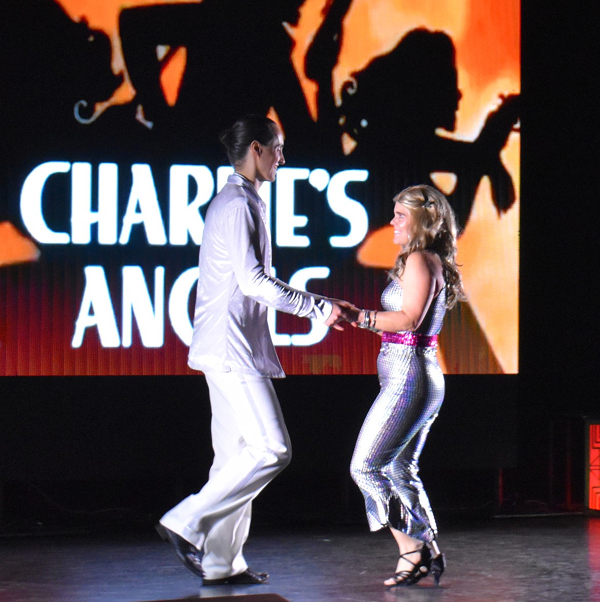 Heather Mason gets in touch with her inner glamorous crime fighter in a cha-cha to the “Charlie’s Angels” theme.