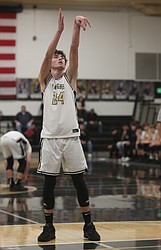 Grant Wardenaar (24) sinks a free throw during their game against Naches Valley earlier this season. The Knights defeated Kiona-Benton 90-42 Saturday with Wardenaar scoring 40 points.