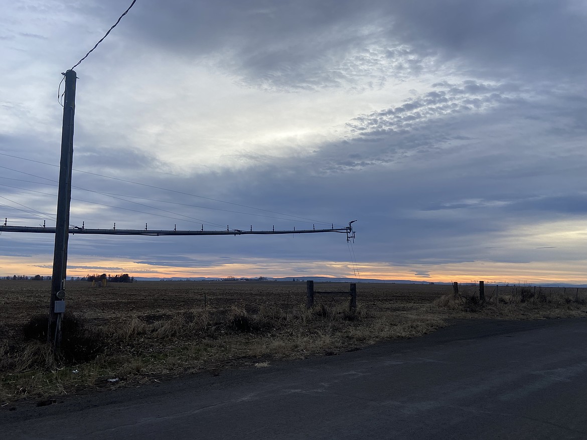 Sun sets in a partly cloudy sky as seen from Road 3 SE south of Moses Lake Monday afternoon. Folks driving around the county may want to use caution Tuesday and Wednesday due to patches of fog expected in the region, especially closer to bodies of water.