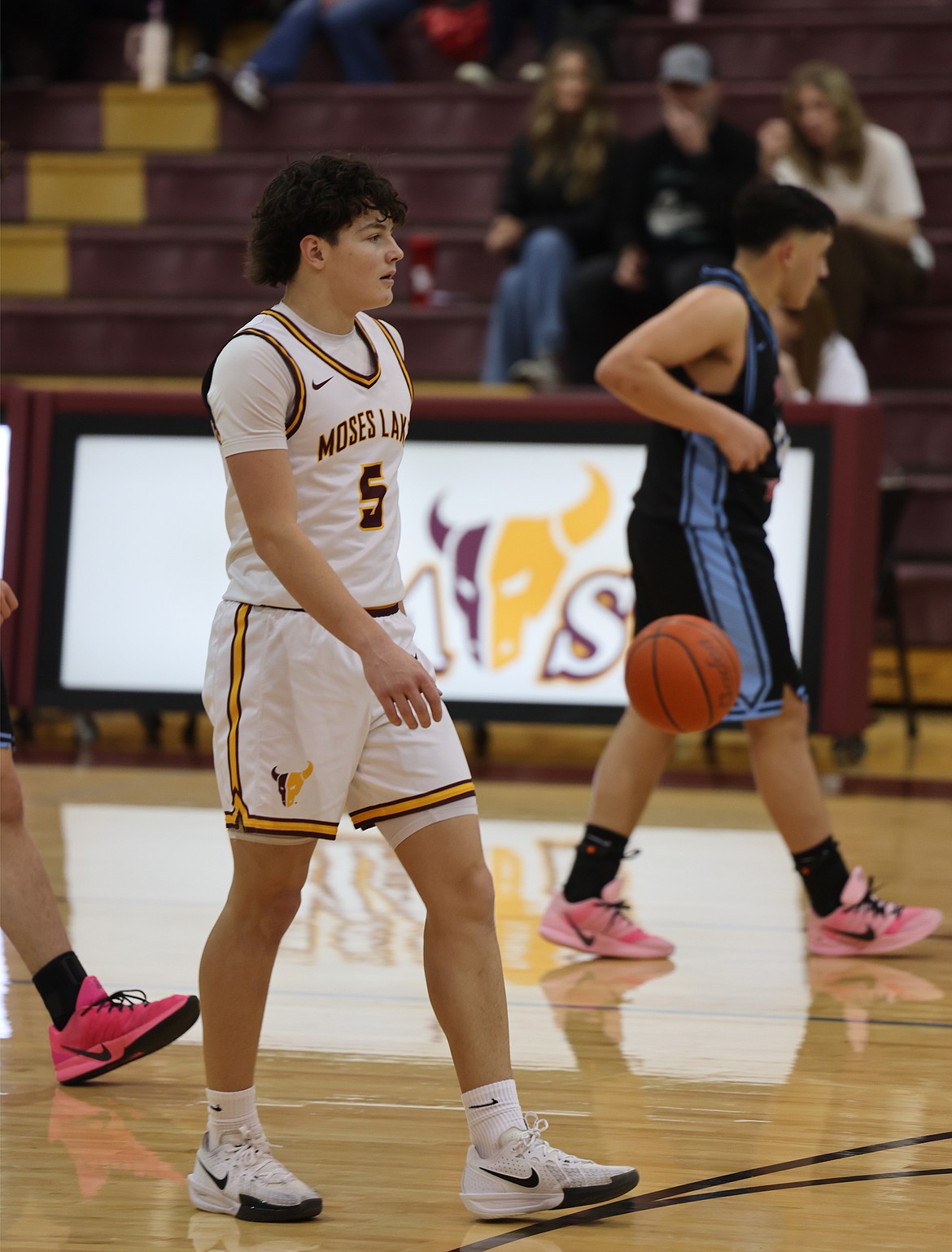 The Mavs’ Case Anderson (5) dribbles the ball up the court during a game earlier this season.