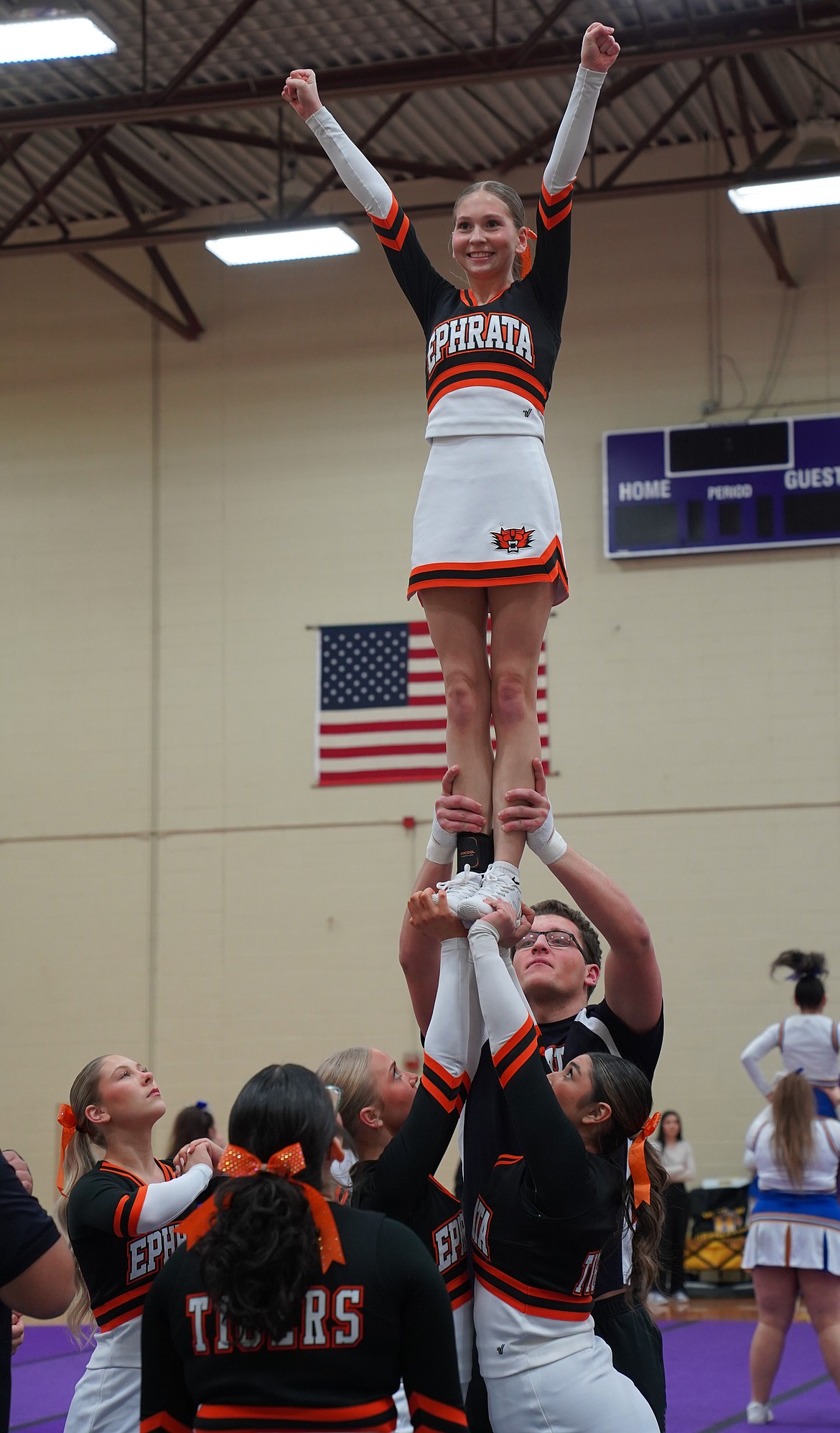 The Ephrata competitive cheer team performs one of their stunts during a competition this season. Head Coach Heather Wood is eager to use their remaining competitions to improve their routine for the state competition.