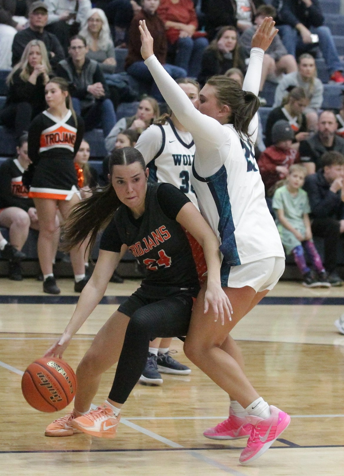 JASON ELLIOTT/Press
Post Falls senior Kailey Walton attempts to dribble around the defense of Lake City senior Taylor Brouse during the first quarter of Wednesday's 6A Inland Empire League girls basketball game at Lake City High.