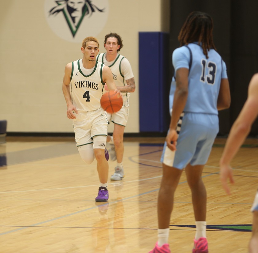 The Vikings’ Sugar Eaton (4) brings the ball up court against Spokane. Big Bend Community College fell to Spokane 80-72 Wednesday in Moses Lake.