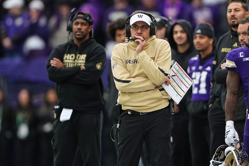FILE - Washington head coach Jedd Fisch watches from the sideline during the first half of an NCAA college football game against Oregon, Saturday, Nov. 29, 2025, in Seattle.