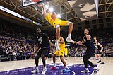 No. 4 Michigan rebounds from 1st loss with 82-72 win at Washington