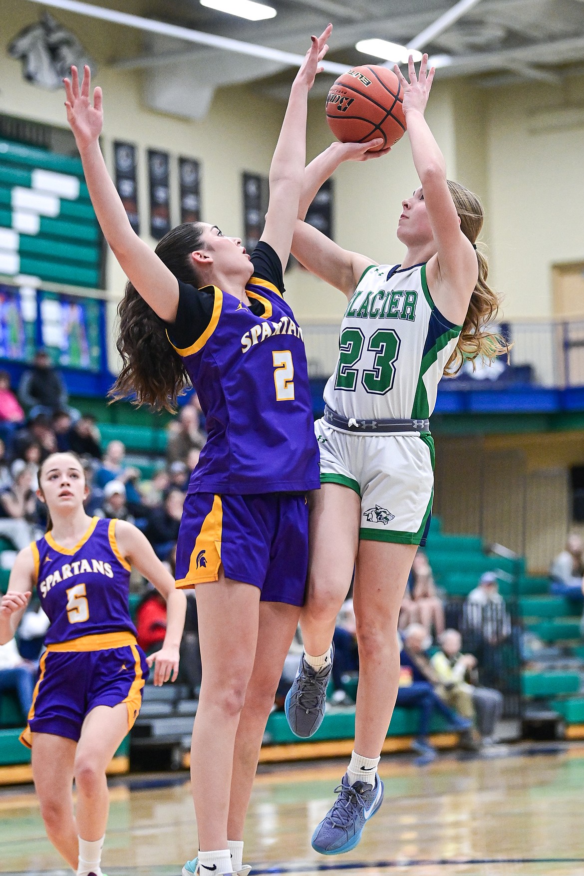Glacier's Olivia Warriner (23) drives into the lane for a shot in the first half against Missoula Sentinel at Glacier High School on Friday, Jan. 16. (Casey Kreider/Daily Inter Lake)