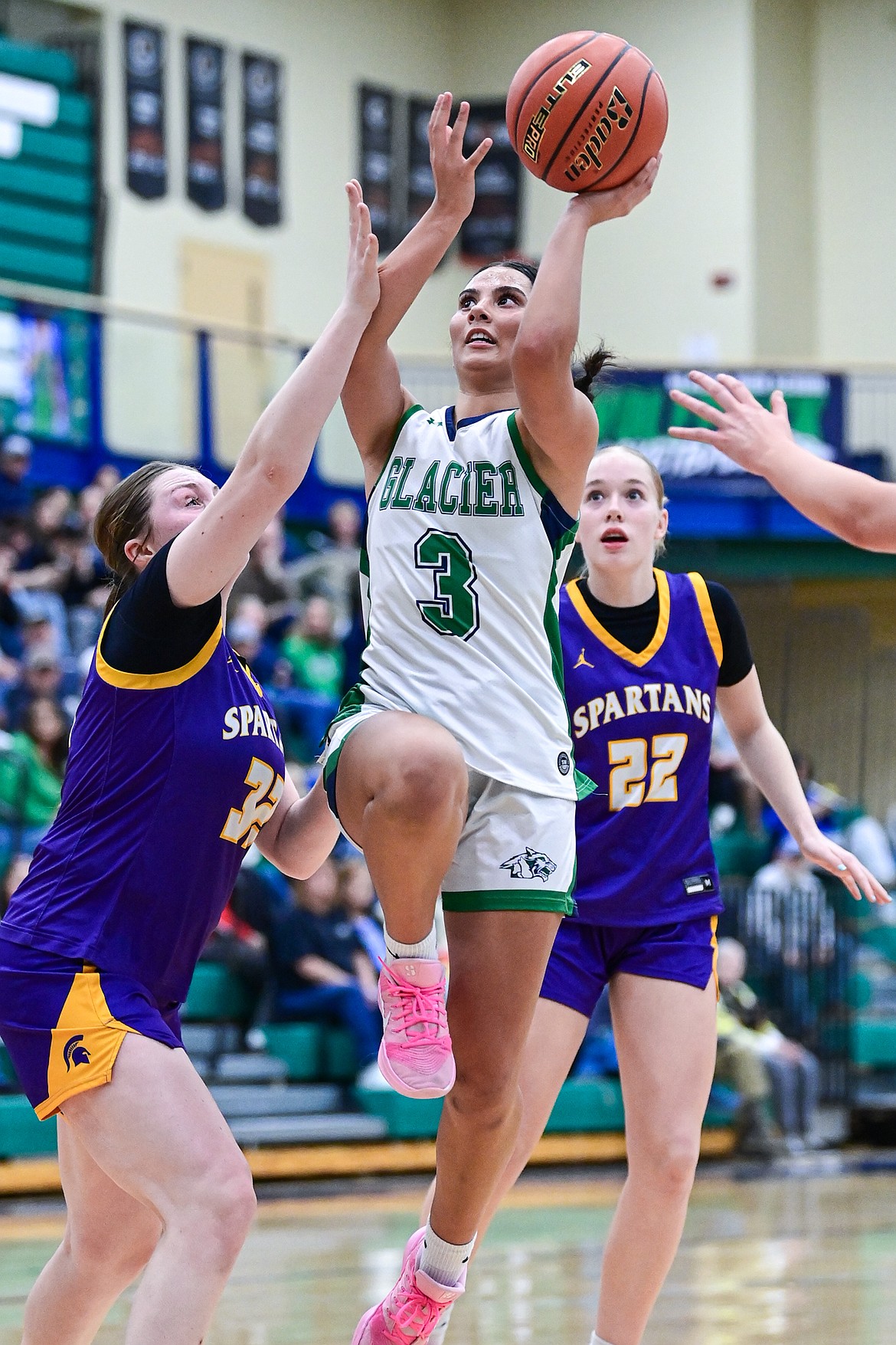 Glacier's Nika Wangerin knocks down a shot in the lane in the first half against Missoula Sentinel at Glacier High School on Friday, Jan. 16. (Casey Kreider/Daily Inter Lake)