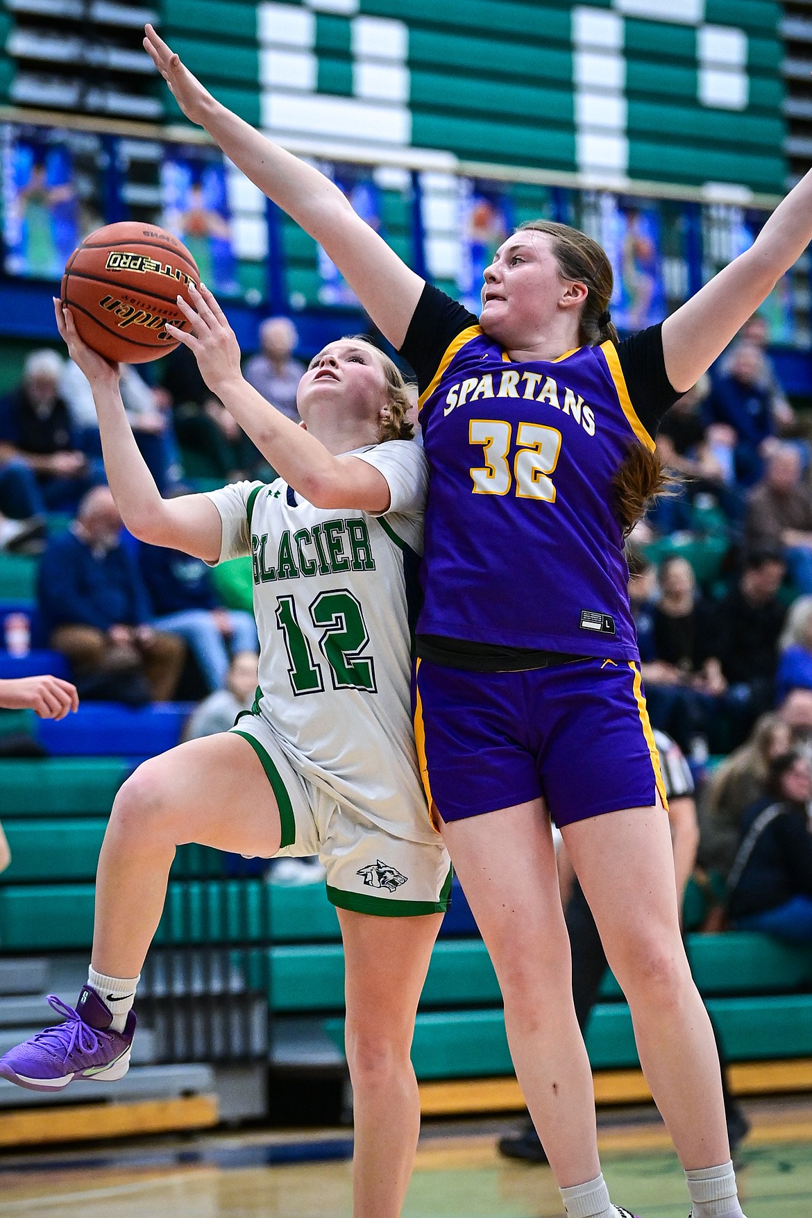 Glacier's Lucy Holloway (12) drives to the basket in the first half against Missoula Sentinel at Glacier High School on Friday, Jan. 16. (Casey Kreider/Daily Inter Lake)