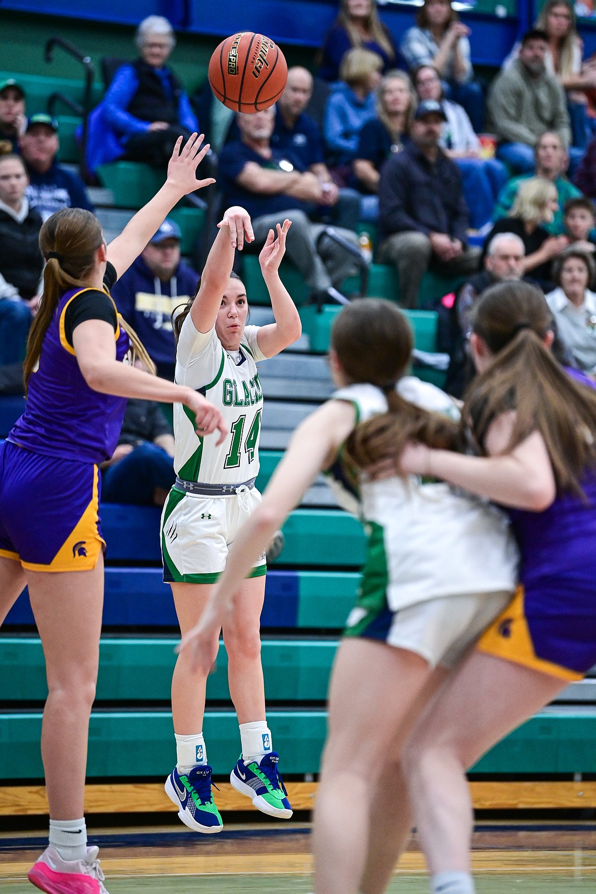 Glacier's Karley Allen (14) knocks down a three in the first half against Missoula Sentinel at Glacier High School on Friday, Jan. 16. (Casey Kreider/Daily Inter Lake)