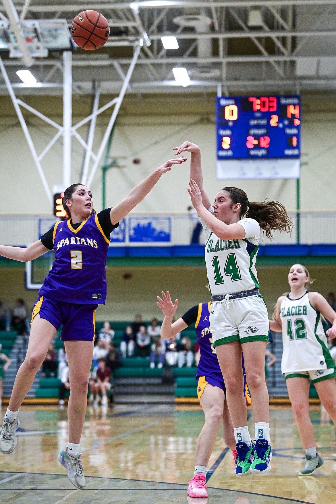 Glacier's Karley Allen (14) draws a foul on a three point shot in the first half against Missoula Sentinel at Glacier High School on Friday, Jan. 16. (Casey Kreider/Daily Inter Lake)