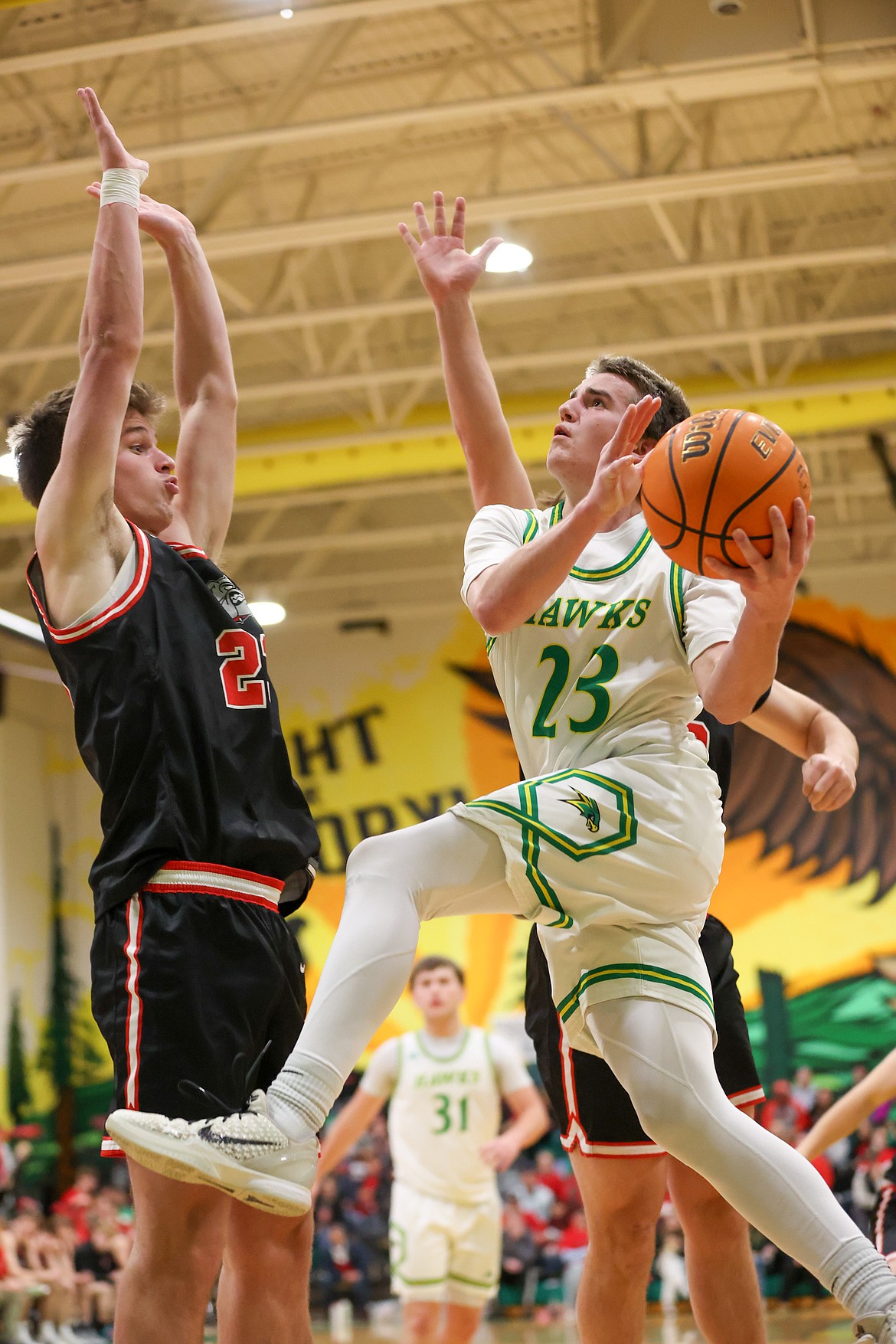 JASON DUCHOW PHOTOGRAPHY
Lakeland sophomore Austin Hocking (23) soars to the basket against Sandpoint in the Battle for the Paddle spirit game Friday night in Rathdrum.